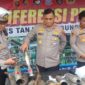 Kapolres Tanjab Timur, Hery, saat jumpa pers dan memperlihatkan knalpot recing yang berhasil diamankan Satlantas Polres Tanjab Timur. Foto: Hambali/koransabak.com